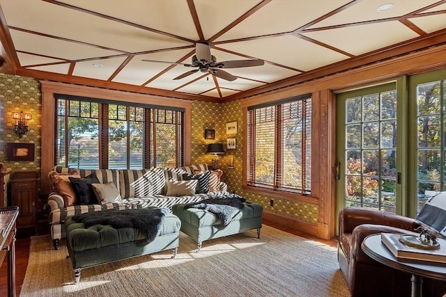 23 Newmarch St, Ipswich, MA 01938 - sitting room featuring healthy amount of natural light, a ceiling fan, wallpapered walls, wood finished floors, and ornamental molding