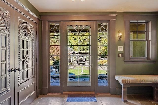 23 Newmarch St, Ipswich, MA 01938 - doorway to outside with plenty of natural light and light tile patterned floors