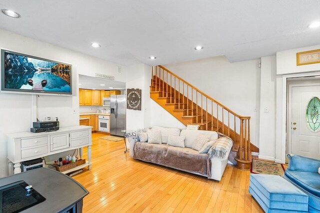 11 Bayside Dr, Wales, MA 01081 - living area with stairway, light wood-style flooring, and recessed lighting