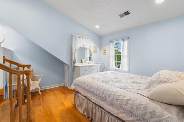 11 Bayside Dr, Wales, MA 01081 - bedroom featuring vaulted ceiling, light wood finished floors, baseboards, and recessed lighting