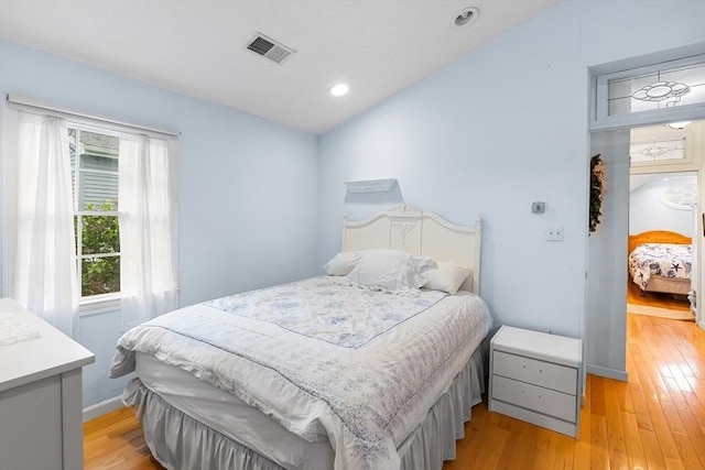 11 Bayside Dr, Wales, MA 01081 - bedroom featuring light wood finished floors, baseboards, and recessed lighting