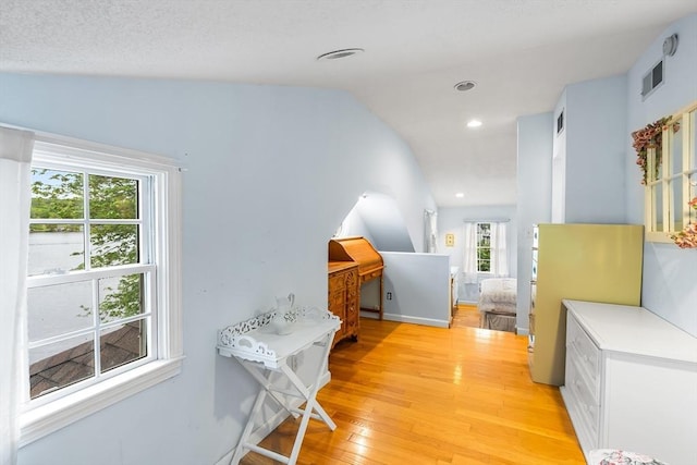 11 Bayside Dr, Wales, MA 01081 - hall with light wood-style flooring, vaulted ceiling, recessed lighting, and baseboards