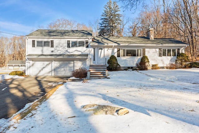 view of front of home with a garage