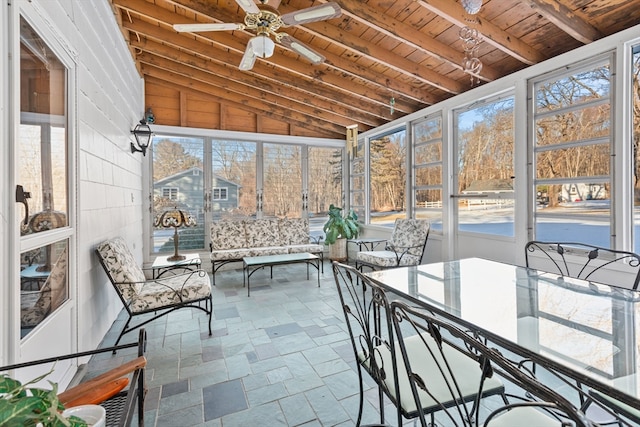 sunroom with wood ceiling, ceiling fan, and vaulted ceiling with beams