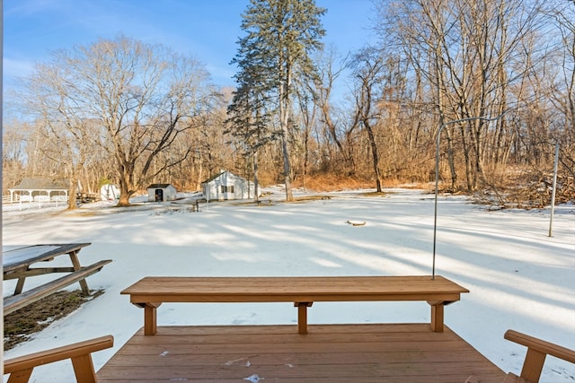 view of snow covered deck