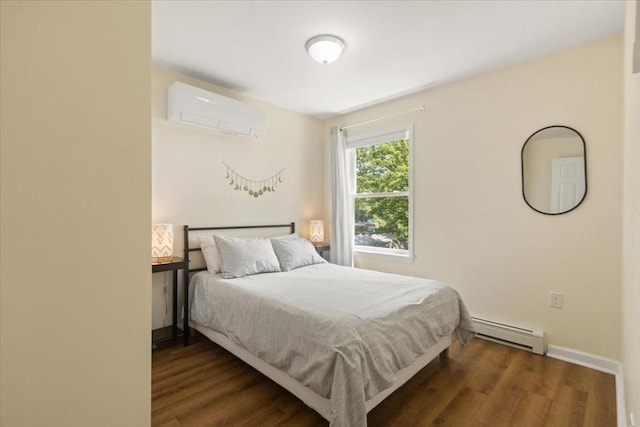 14 Carlson Cv, Weymouth, MA 02189 - bedroom with a baseboard radiator, an AC wall unit, wood finished floors, and baseboards