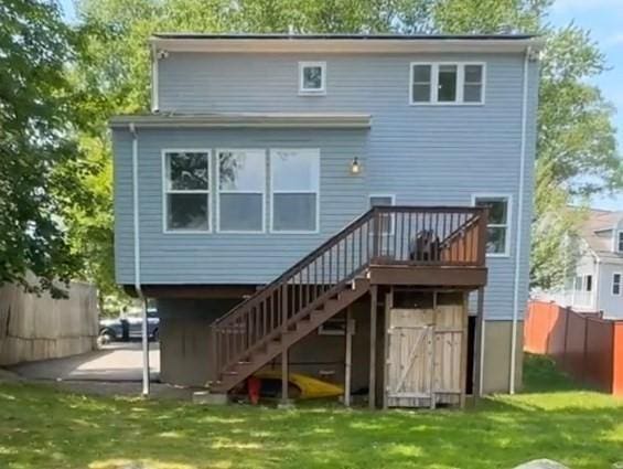 14 Carlson Cv, Weymouth, MA 02189 - back of property featuring stairs and a wooden deck