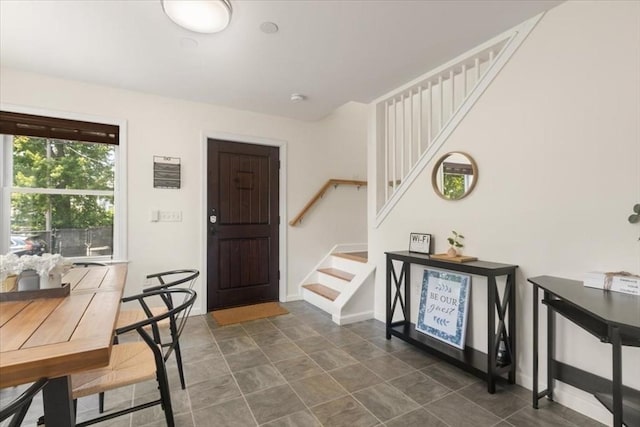 14 Carlson Cv, Weymouth, MA 02189 - entrance foyer featuring stairway, baseboards, and stone finish flooring