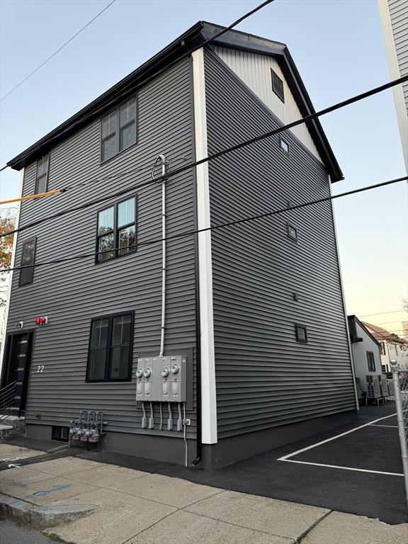 view of property exterior at dusk