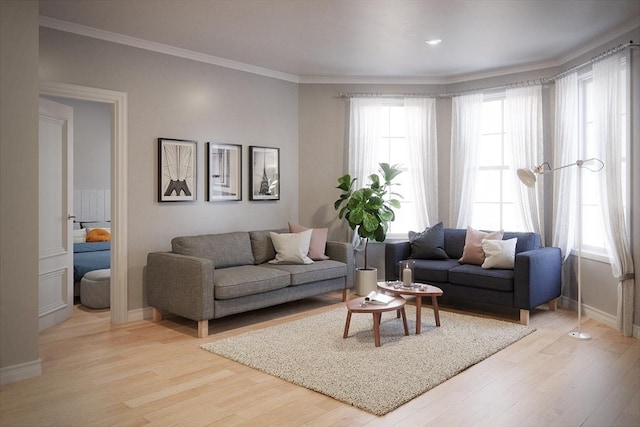 living area featuring light wood-style flooring, baseboards, and ornamental molding