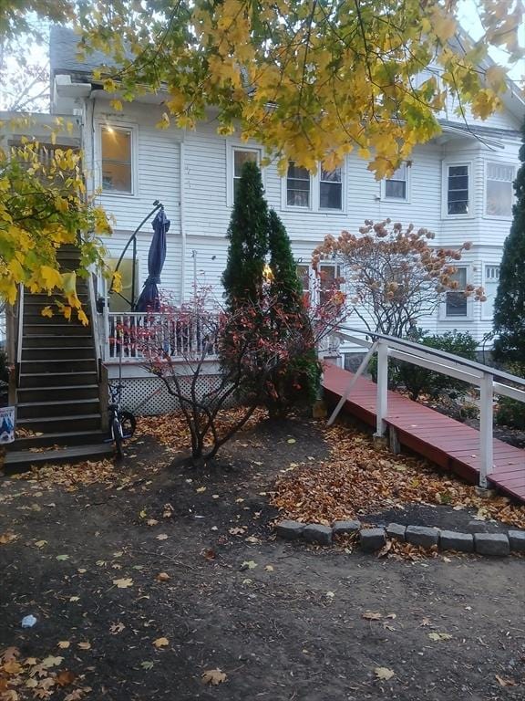 view of front of house with a deck