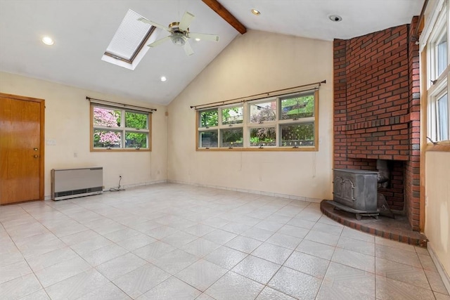 unfurnished living room with high vaulted ceiling, a wood stove, beamed ceiling, heating unit, and light tile patterned floors