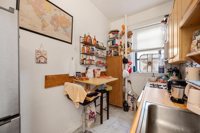 39 Glenville Ave Unit 2, Boston, MA 02134 - kitchen with light marble finish flooring, light countertops, and open shelves