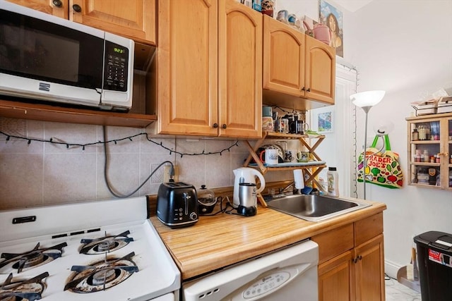 39 Glenville Ave Unit 2, Boston, MA 02134 - kitchen featuring white appliances, decorative backsplash, light countertops, and open shelves