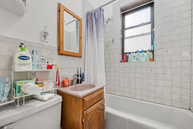 39 Glenville Ave Unit 2, Boston, MA 02134 - full bathroom featuring tile walls, vanity, shower / bath combo with shower curtain, and backsplash
