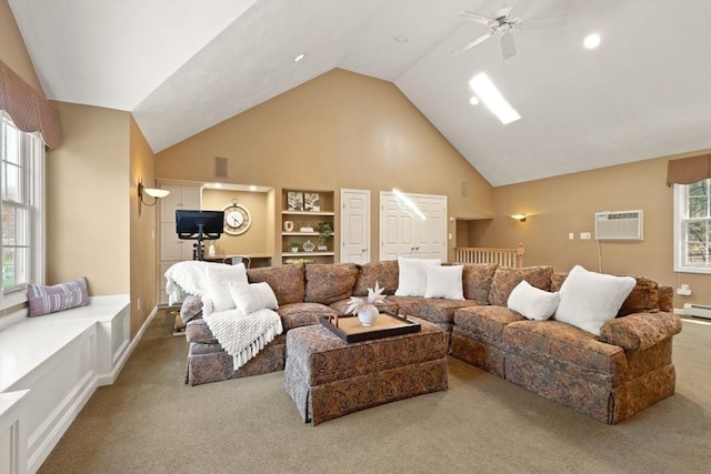 living area with carpet flooring, a ceiling fan, a wall mounted AC, and high vaulted ceiling