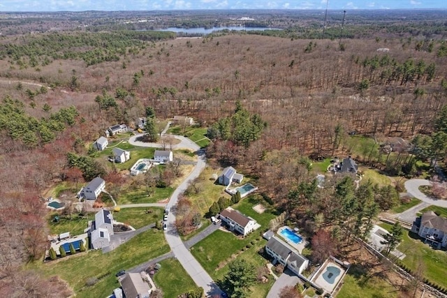 aerial view featuring a forest view