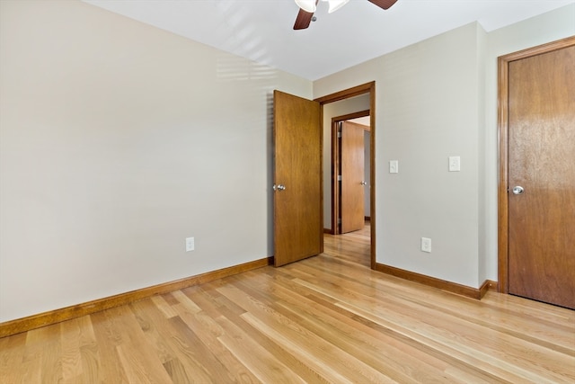 unfurnished bedroom featuring light hardwood / wood-style floors and ceiling fan