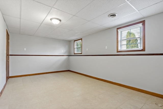 empty room with a drop ceiling