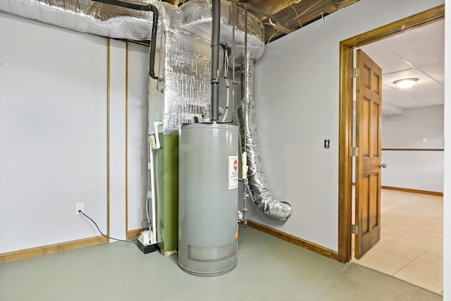 utility room featuring gas water heater