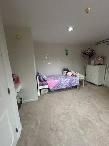 unfurnished bedroom featuring carpet