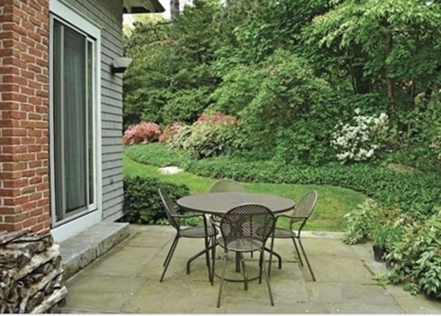 view of patio featuring outdoor dining space