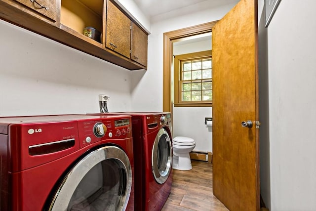 92 Rocky Hill Rd, Rehoboth, MA 02769 - washroom featuring washing machine and clothes dryer, wood finished floors, and a baseboard radiator
