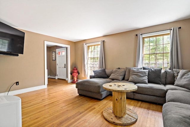 92 Rocky Hill Rd, Rehoboth, MA 02769 - living room with light wood finished floors, a baseboard heating unit, and baseboards