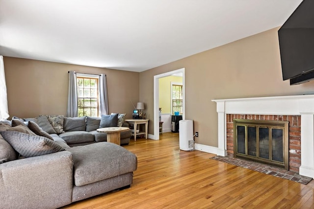 92 Rocky Hill Rd, Rehoboth, MA 02769 - living room with light wood-type flooring, a fireplace, and baseboards
