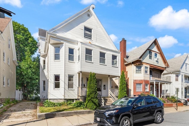 12 Porter St, Everett, MA 02149 - view of front of property featuring covered porch
