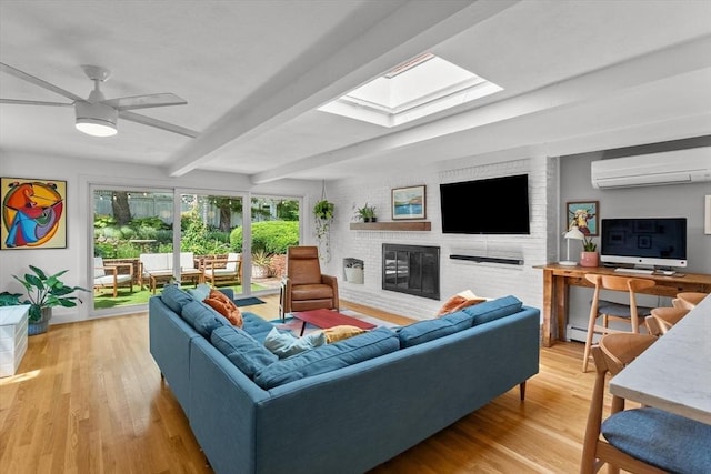 6 Hayes Rd, Salem, MA 01970 - living room with a wall mounted air conditioner, a fireplace, a skylight, a baseboard heating unit, and beam ceiling