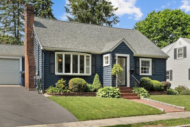 6 Hayes Rd, Salem, MA 01970 - view of front of property with a chimney, entry steps, roof with shingles, and a front yard