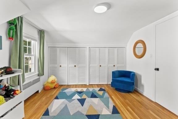 6 Hayes Rd, Salem, MA 01970 - playroom with radiator heating unit and wood finished floors