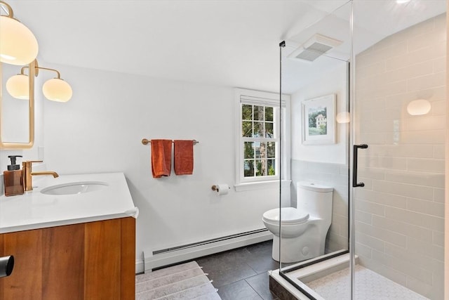 6 Hayes Rd, Salem, MA 01970 - bathroom featuring baseboard heating, vanity, a stall shower, and tile patterned floors