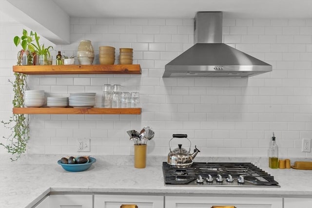 6 Hayes Rd, Salem, MA 01970 - kitchen with wall chimney exhaust hood, open shelves, stainless steel gas cooktop, decorative backsplash, and white cabinetry