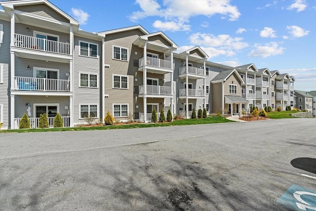 view of building exterior with a residential view