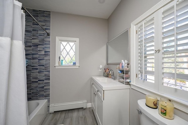 bathroom with a baseboard radiator, wood finished floors, toilet, vanity, and shower / bath combo with shower curtain