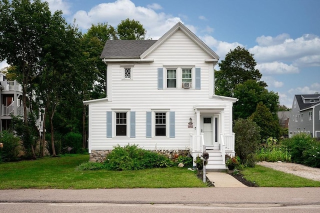 view of front of home featuring a front yard