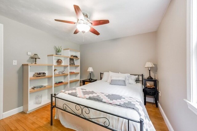 2470 W St, Wrentham, MA 02093 - bedroom with light wood-style floors, baseboards, and a ceiling fan
