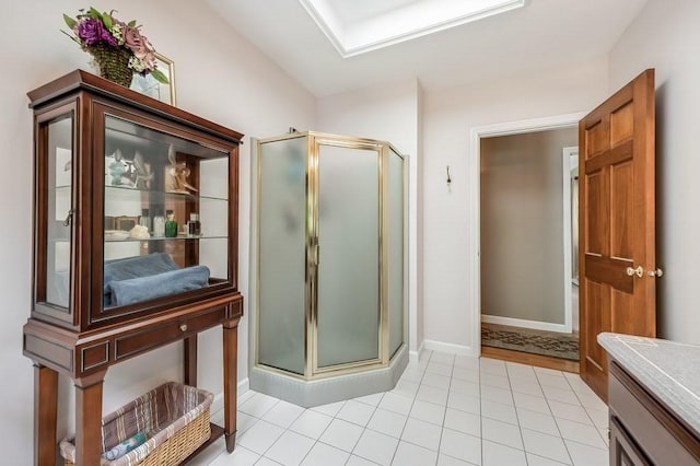 2470 W St, Wrentham, MA 02093 - bathroom featuring a shower stall, vanity, baseboards, and tile patterned floors