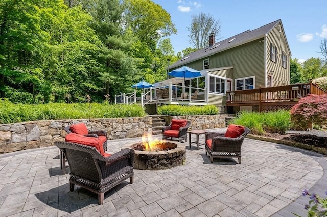 2470 W St, Wrentham, MA 02093 - view of patio with a fire pit and a deck