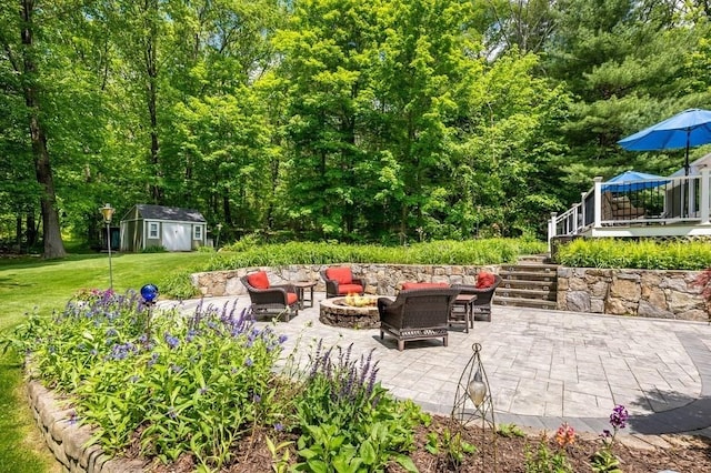 2470 W St, Wrentham, MA 02093 - view of patio featuring stairs, an outbuilding, an outdoor living space with a fire pit, and a deck