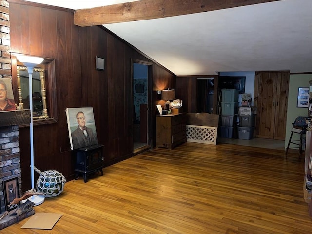 127 Depot Rd, Boxford, MA 01921 - living area with wood finished floors, a brick fireplace, and wood walls