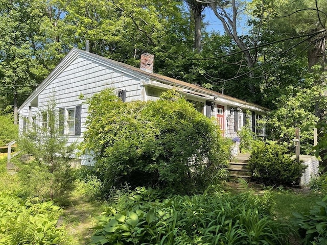 127 Depot Rd, Boxford, MA 01921 - view of side of property with a chimney