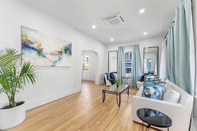 sitting room featuring light hardwood / wood-style floors