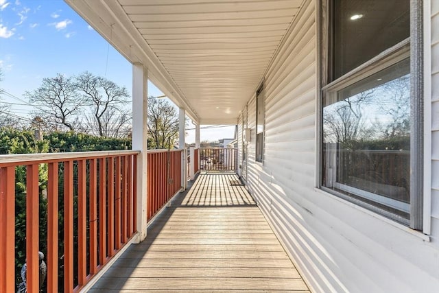 wooden terrace featuring a porch