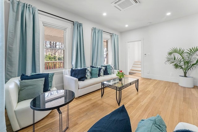 living room with hardwood / wood-style floors