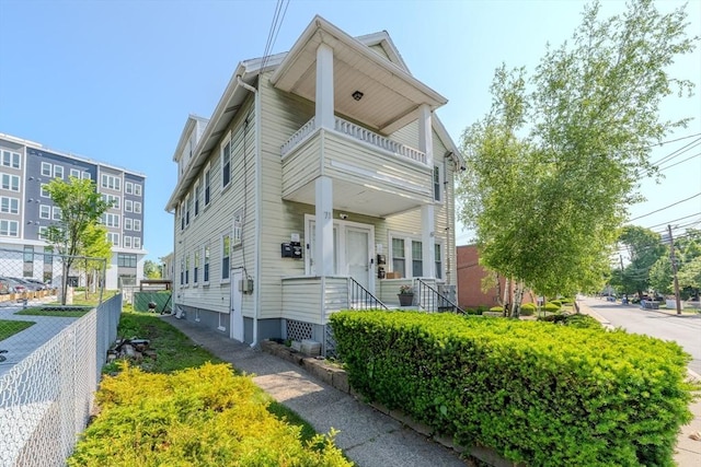 69-71 Pond St, Waltham, MA 02451 - view of front of property featuring a balcony