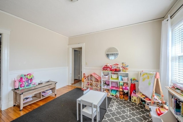 69-71 Pond St, Waltham, MA 02451 - recreation room with wood finished floors and crown molding