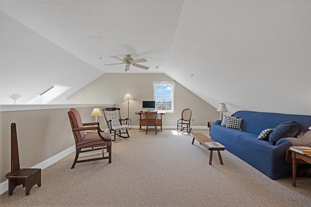 living area featuring carpet, baseboards, and ceiling fan